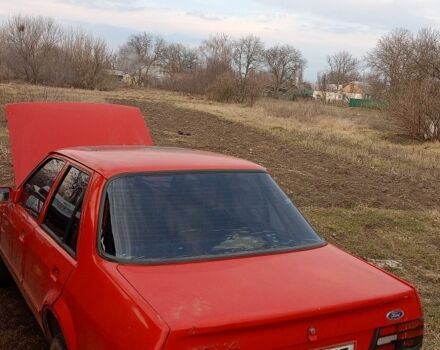 Красный Форд Орион, объемом двигателя 1.4 л и пробегом 111 тыс. км за 600 $, фото 1 на Automoto.ua