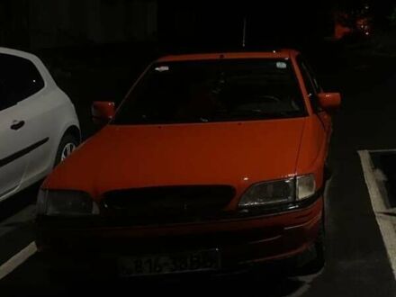 Красный Форд Орион, объемом двигателя 1.8 л и пробегом 56 тыс. км за 750 $, фото 1 на Automoto.ua
