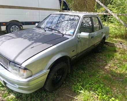 Серый Форд Орион, объемом двигателя 1.3 л и пробегом 200 тыс. км за 601 $, фото 3 на Automoto.ua