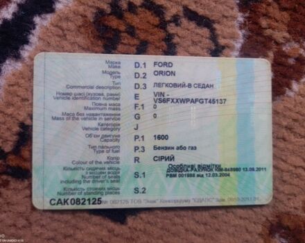 Серый Форд Орион, объемом двигателя 1.6 л и пробегом 58 тыс. км за 600 $, фото 1 на Automoto.ua