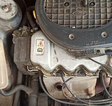 Серый Форд Орион, объемом двигателя 1.4 л и пробегом 100 тыс. км за 1400 $, фото 8 на Automoto.ua