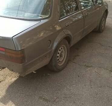 Серый Форд Орион, объемом двигателя 1.4 л и пробегом 100 тыс. км за 1400 $, фото 3 на Automoto.ua