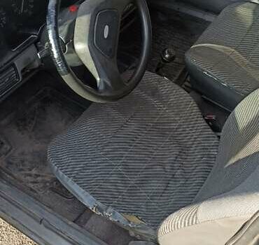 Серый Форд Орион, объемом двигателя 1.4 л и пробегом 100 тыс. км за 1400 $, фото 4 на Automoto.ua