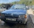 Серый Форд Орион, объемом двигателя 1.8 л и пробегом 100 тыс. км за 600 $, фото 1 на Automoto.ua