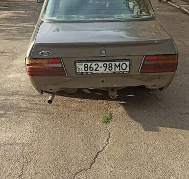 Серый Форд Орион, объемом двигателя 1.4 л и пробегом 100 тыс. км за 1400 $, фото 1 на Automoto.ua