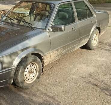 Серый Форд Орион, объемом двигателя 1.4 л и пробегом 100 тыс. км за 1400 $, фото 2 на Automoto.ua