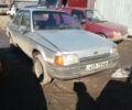 Серый Форд Орион, объемом двигателя 1 л и пробегом 500 тыс. км за 113 $, фото 1 на Automoto.ua