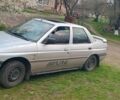 Серый Форд Орион, объемом двигателя 1 л и пробегом 1 тыс. км за 671 $, фото 1 на Automoto.ua