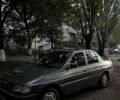 Серый Форд Орион, объемом двигателя 1.8 л и пробегом 150 тыс. км за 652 $, фото 1 на Automoto.ua