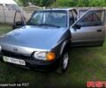 Серый Форд Орион, объемом двигателя 1.3 л и пробегом 100 тыс. км за 720 $, фото 1 на Automoto.ua