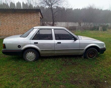 Серый Форд Орион, объемом двигателя 1.3 л и пробегом 300 тыс. км за 300 $, фото 1 на Automoto.ua