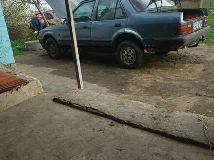 Серый Форд Орион, объемом двигателя 0 л и пробегом 100 тыс. км за 472 $, фото 1 на Automoto.ua