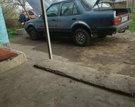 Серый Форд Орион, объемом двигателя 0 л и пробегом 100 тыс. км за 472 $, фото 1 на Automoto.ua