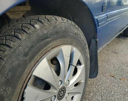 Синий Форд Орион, объемом двигателя 1.4 л и пробегом 174 тыс. км за 900 $, фото 1 на Automoto.ua