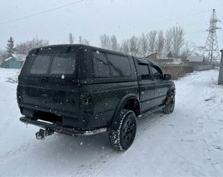Черный Форд Рейнджер, объемом двигателя 2.5 л и пробегом 230 тыс. км за 3950 $, фото 4 на Automoto.ua