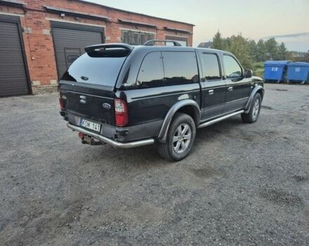 Черный Форд Рейнджер, объемом двигателя 2.5 л и пробегом 238 тыс. км за 2600 $, фото 3 на Automoto.ua