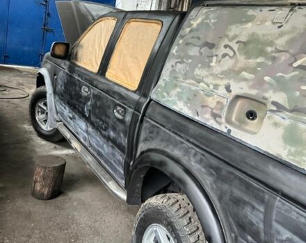 Черный Форд Рейнджер, объемом двигателя 2.5 л и пробегом 186 тыс. км за 7148 $, фото 12 на Automoto.ua