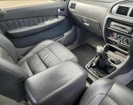 Черный Форд Рейнджер, объемом двигателя 2.5 л и пробегом 120 тыс. км за 6341 $, фото 13 на Automoto.ua