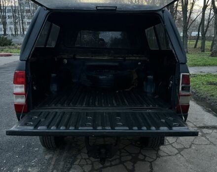 Черный Форд Рейнджер, объемом двигателя 2.5 л и пробегом 231 тыс. км за 5200 $, фото 9 на Automoto.ua
