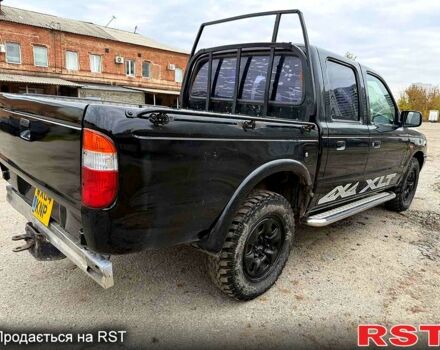 Черный Форд Рейнджер, объемом двигателя 2.5 л и пробегом 180 тыс. км за 3800 $, фото 5 на Automoto.ua