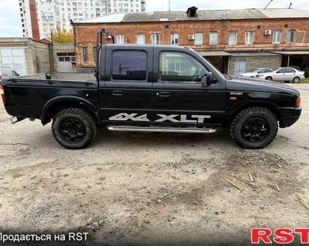 Черный Форд Рейнджер, объемом двигателя 2.5 л и пробегом 180 тыс. км за 3800 $, фото 4 на Automoto.ua