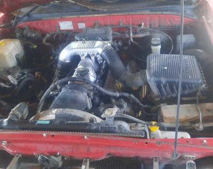 Красный Форд Рейнджер, объемом двигателя 2.5 л и пробегом 280 тыс. км за 3300 $, фото 3 на Automoto.ua