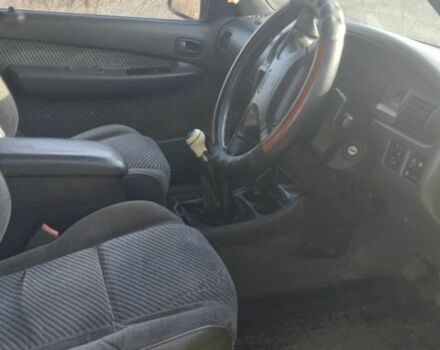 Красный Форд Рейнджер, объемом двигателя 2 л и пробегом 199 тыс. км за 5000 $, фото 3 на Automoto.ua