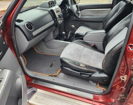 Красный Форд Рейнджер, объемом двигателя 3 л и пробегом 166 тыс. км за 8025 $, фото 16 на Automoto.ua