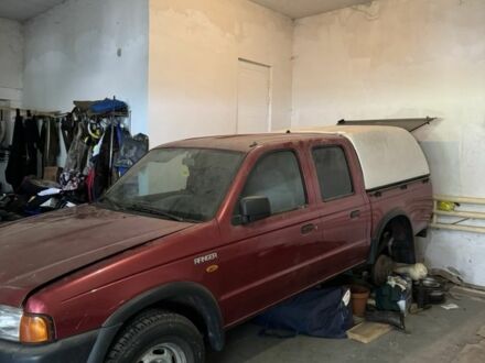 Красный Форд Рейнджер, объемом двигателя 2.5 л и пробегом 200 тыс. км за 3500 $, фото 1 на Automoto.ua