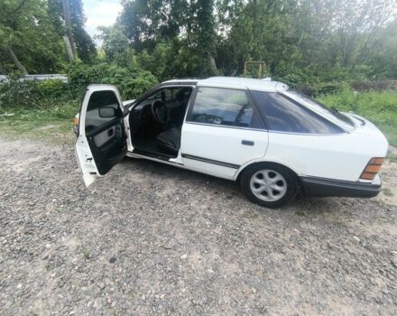 Белый Форд Скорпио, объемом двигателя 3 л и пробегом 345 тыс. км за 811 $, фото 1 на Automoto.ua