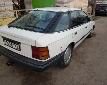 Белый Форд Скорпио, объемом двигателя 2 л и пробегом 500 тыс. км за 64000 $, фото 2 на Automoto.ua