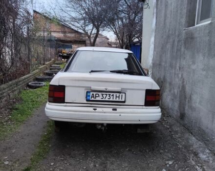 Белый Форд Скорпио, объемом двигателя 1.8 л и пробегом 210 тыс. км за 582 $, фото 2 на Automoto.ua