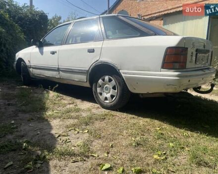 Белый Форд Скорпио, объемом двигателя 2 л и пробегом 360 тыс. км за 1100 $, фото 1 на Automoto.ua