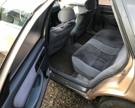 Бежевый Форд Скорпио, объемом двигателя 2.4 л и пробегом 300 тыс. км за 1250 $, фото 9 на Automoto.ua