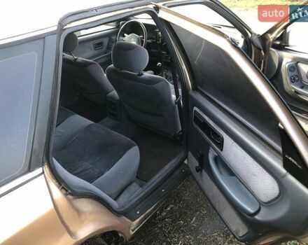 Бежевый Форд Скорпио, объемом двигателя 2.4 л и пробегом 300 тыс. км за 1250 $, фото 7 на Automoto.ua