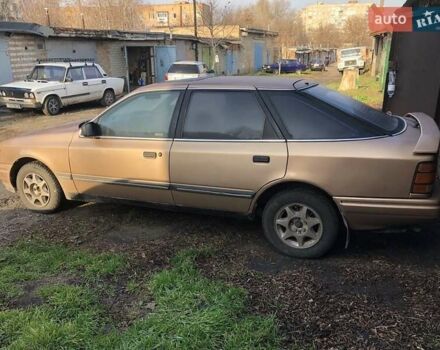 Бежевый Форд Скорпио, объемом двигателя 2.4 л и пробегом 300 тыс. км за 1250 $, фото 1 на Automoto.ua