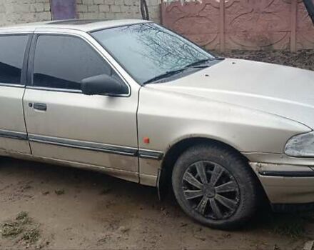 Бежевый Форд Скорпио, объемом двигателя 2 л и пробегом 349 тыс. км за 1000 $, фото 1 на Automoto.ua