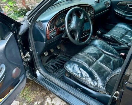 Чорний Форд Скорпіо, об'ємом двигуна 2 л та пробігом 340 тис. км за 1499 $, фото 4 на Automoto.ua