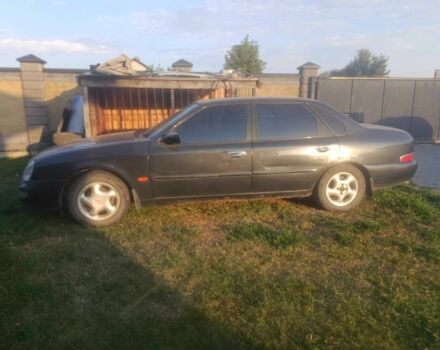 Черный Форд Скорпио, объемом двигателя 2 л и пробегом 265 тыс. км за 900 $, фото 2 на Automoto.ua