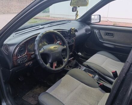 Черный Форд Скорпио, объемом двигателя 2 л и пробегом 140 тыс. км за 1600 $, фото 7 на Automoto.ua