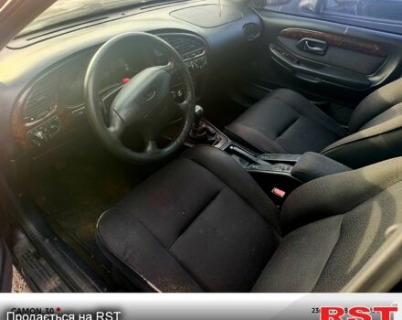 Коричневый Форд Скорпио, объемом двигателя 2 л и пробегом 220 тыс. км за 1850 $, фото 3 на Automoto.ua