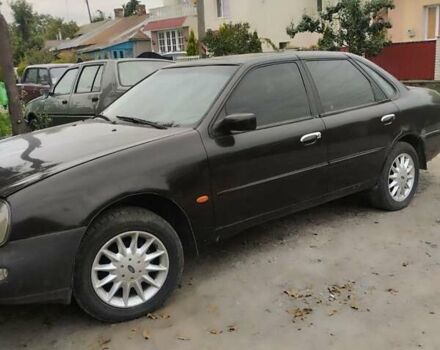 Коричневый Форд Скорпио, объемом двигателя 2 л и пробегом 200 тыс. км за 1100 $, фото 1 на Automoto.ua