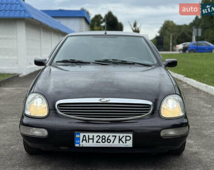 Коричневый Форд Скорпио, объемом двигателя 2 л и пробегом 250 тыс. км за 2499 $, фото 4 на Automoto.ua