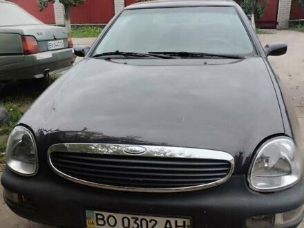 Коричневий Форд Скорпіо, об'ємом двигуна 2 л та пробігом 200 тис. км за 1100 $, фото 1 на Automoto.ua