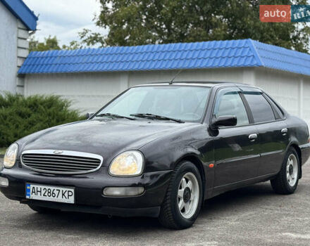 Коричневий Форд Скорпіо, об'ємом двигуна 2 л та пробігом 250 тис. км за 2499 $, фото 1 на Automoto.ua