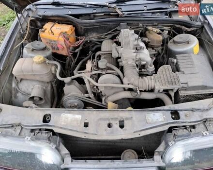 Сірий Форд Скорпіо, об'ємом двигуна 2 л та пробігом 400 тис. км за 1000 $, фото 1 на Automoto.ua