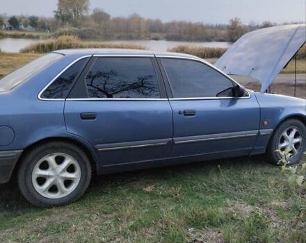 Форд Скорпіо 1990 у Зенькове на Automoto.ua Синій Форд Скорпіо, об'ємом двигуна 2 л та пробігом 308 тис. км за 2000 $, фото 6 на Automoto.ua