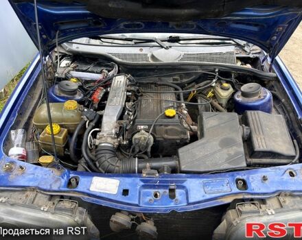 Синий Форд Скорпио, объемом двигателя 2 л и пробегом 325 тыс. км за 1100 $, фото 10 на Automoto.ua