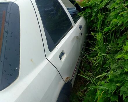 Белый Форд Сиерра, объемом двигателя 2 л и пробегом 350 тыс. км за 350 $, фото 2 на Automoto.ua