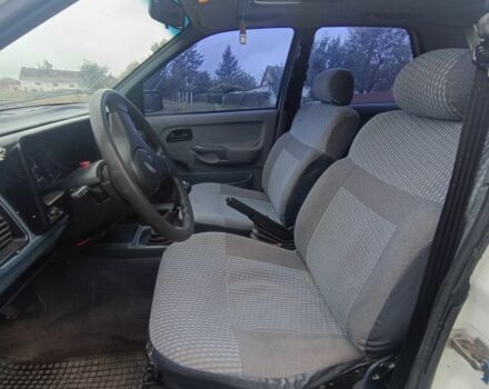 Белый Форд Сиерра, объемом двигателя 1.8 л и пробегом 330 тыс. км за 900 $, фото 7 на Automoto.ua